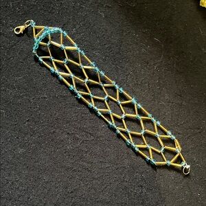 Elegant Gold and Blue Bracelet